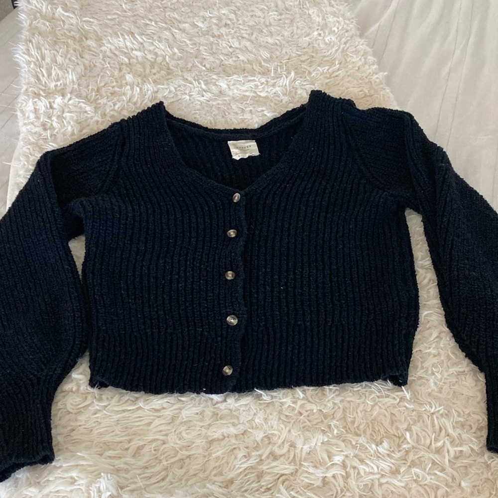 Francesca’s black cardigan